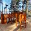 Schiff Modern Nature Holzspielgerät mit Kletterleiter und Brücke für den Spielplatz.