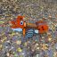 Fuchs Federwippe uf em Spielplatz, Holz und orange Farb mit Feder zum Wippe.