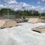 Olly Box 3 Skatepark Rampe und Plattformen aus hellem Material auf Betonplatte