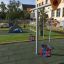 Baby Schaukel Kinderschaukel mit roter und blauer Sitzfläche auf Spielplatz