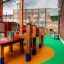 Wetpour 40 Bodenbelag für sicheren Spielplatz mit Holzspielgeräten