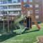 Twister Spielanlage mit grüner Spiralrutsche und Klettergerüst auf Spielplatz
