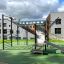 New Age Fit MEDIUM Element für Outdoor-Fitness und Spielplatz mit Turnringen und Kletterwand.