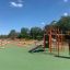 New Age Fit Kletterturm mit Reifen und Rutsche auf Spielplatz
