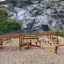 Fitness Anlage aus Holz für Outdoor-Bewegung auf Spielplatz mit Kletter- und Balanciermöglichkeiten.